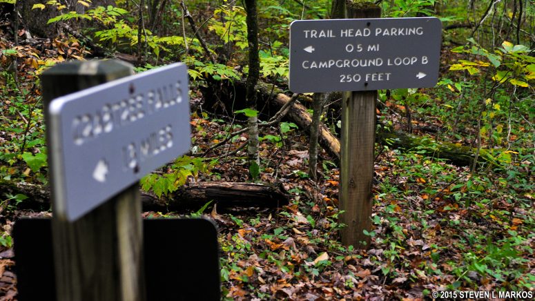 Trail signs on the Blue Ridge Parkway's Crabtree Falls Loop Trail direct hikers back to the parking areas