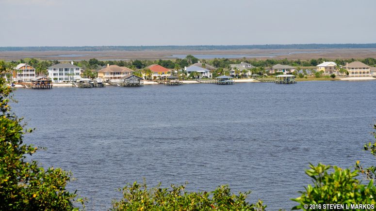 View of the mansions along the St. Johns River from the Ribault Monument property