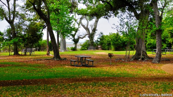 Picnic tables at the William M. Colmer Visitor Center in the Davis Bayou unit of Gulf Islands National Seashore