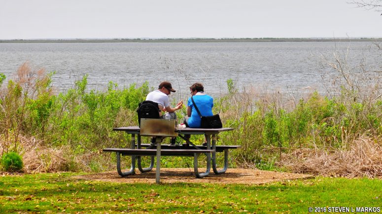Picnic table overlooks Davis Bayou near the William M. Colmer Visitor Center, Gulf Islands National Seashore