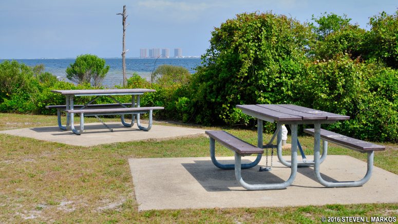 Picnic tables on their own cement pad at Naval Live Oaks, Gulf Islands National Seashore