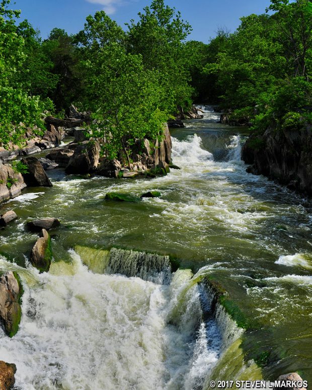 Rapids and waterfalls below the footbridge on the Olmstead Island Brides Trail in Chesapeake and Ohio Canal National Historical Park