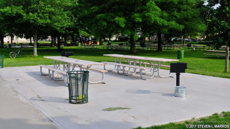 Handicap accessible tables and grill at the Miller Field Picnic Area in the Staten Island unit of Gateway National Recreation Area