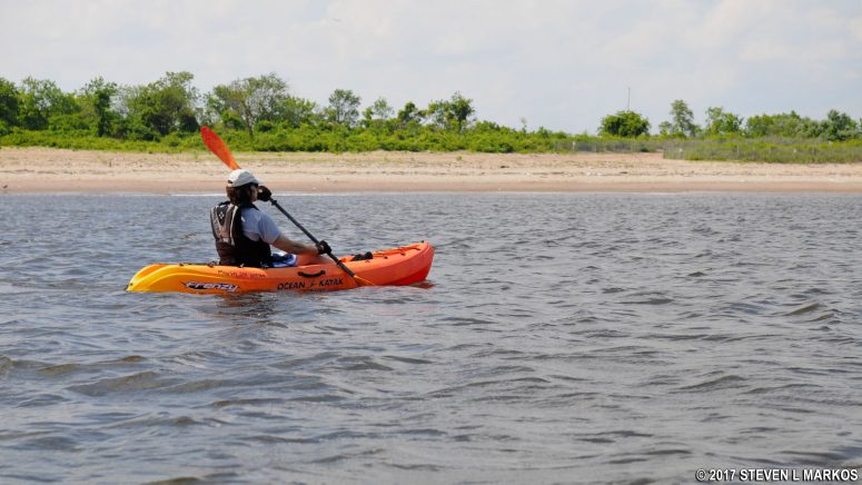 Park Ranger leads a group kayaking off the beach at Great Kills Park, Gateway National Recreation Area