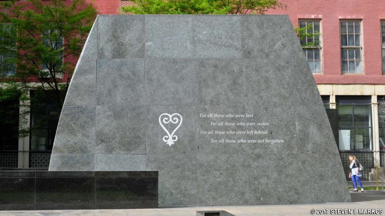Sankofa symbol on the side of the African Burial Ground Memorial's Ancestral Chamber facing Duane Street
