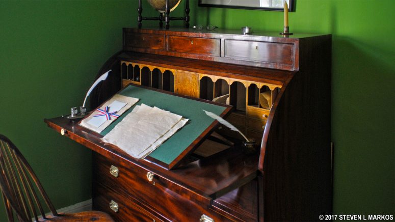 Antique desk and chair on display in Alexander Hamilton's study