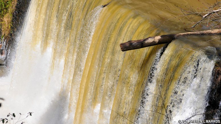 Close-up of the water flowing over Vickery Creek Dam in Roswell, Georgia