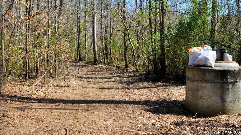A detour around the swamp between intersections CS 31 and CS 18 in the Cochran Shoals / Interstate North section of Chattahoochee River National Recreation Area begins at a cement structure prior to the swamp