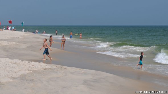 Kids playing in the ocean at Watch Hill