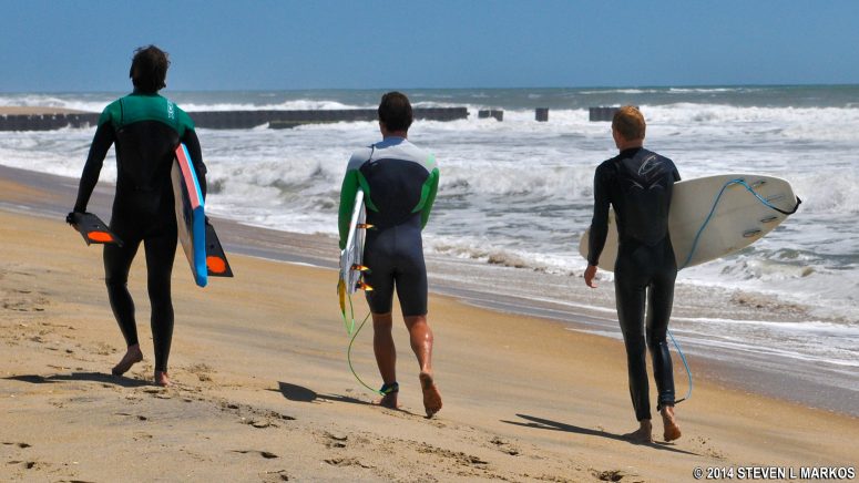 Surfers at Old Lighthouse Beach in Cape Hatteras National Seashore