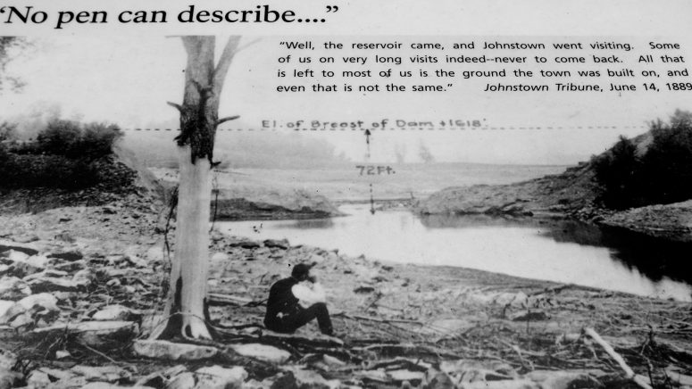 Photo showing the gap in the South Fork Dam shortly after the collapse on May 31, 1899