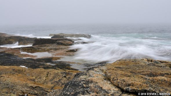 Waves crash on the rocks at Schoodic Point on the Schoodic Peninsula, Acadia National Park