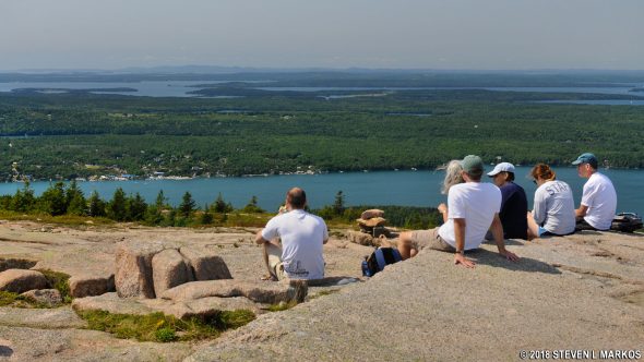 Hikers take a rest at the top of Acadia National Park's Sargent Mountain