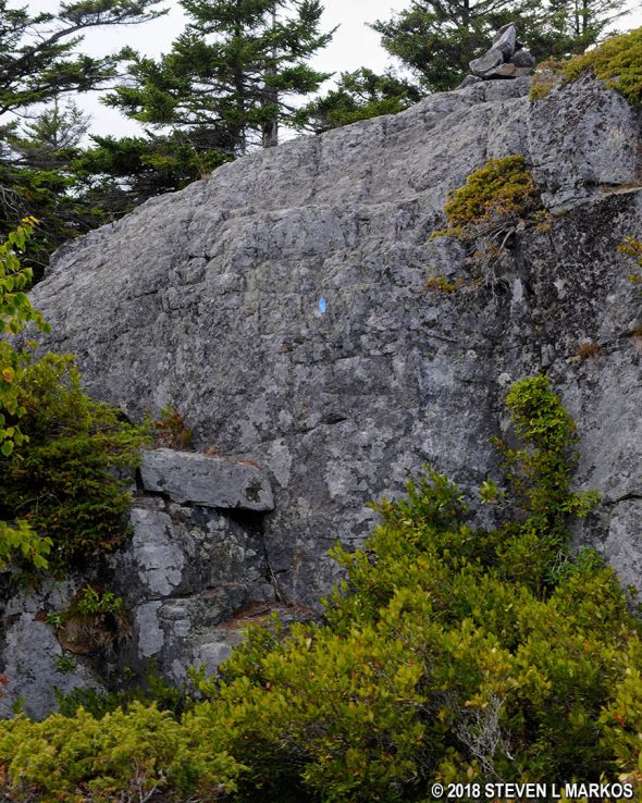 Rock wall that must be climbed to reach the summit of Duck Harbor Mountain on Acadia National Park's Isle au Haut