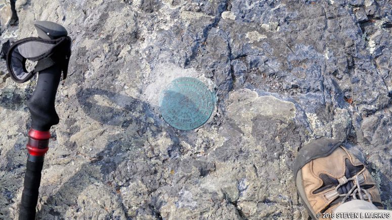 Summit marker for Duck Harbor Mountain on Acadia National Park's Isle au Haut