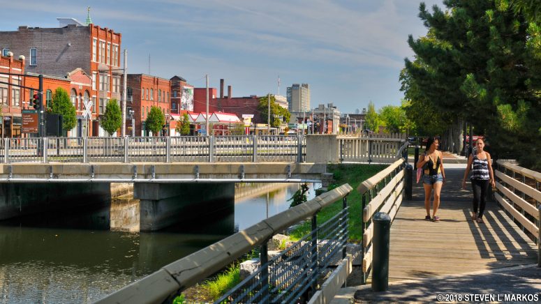 Walk along the Merrimack Canal towards the Lowell National Historical Park Visitor Center parking lot
