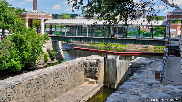 Glass-paneled walkway across the Pawtucket Canal near the Lower Locks, Lowell National Historical Park