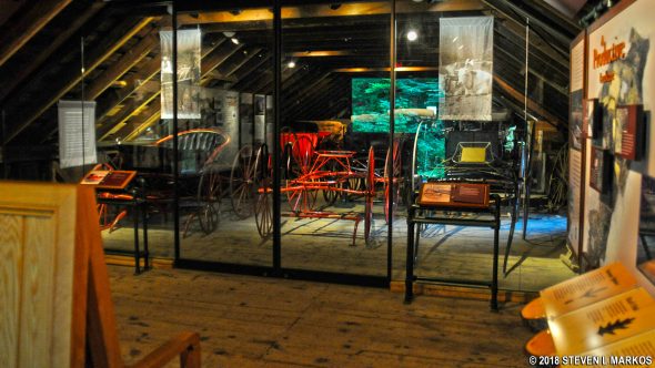 Collection of carriages inside the Wood Barn at Marsh-Billings-Rockefeller National Historical Park