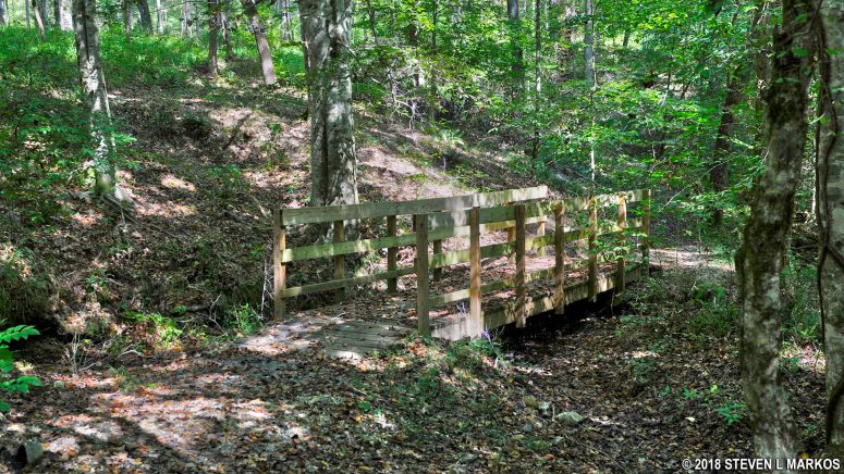 The Nature Trail crosses a small creak using wooden footbridges