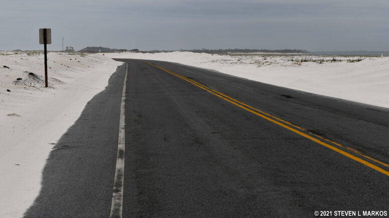 Sand covers part of the bike lane at Fort Pickens, Gulf Islands National Seashore