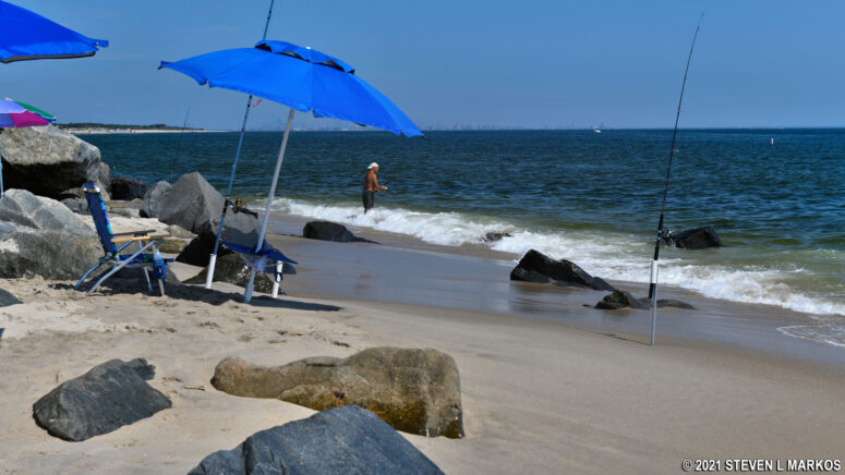 Fishing at the boulders on Beach C at Sandy Hook in Gateway National Recreation Area