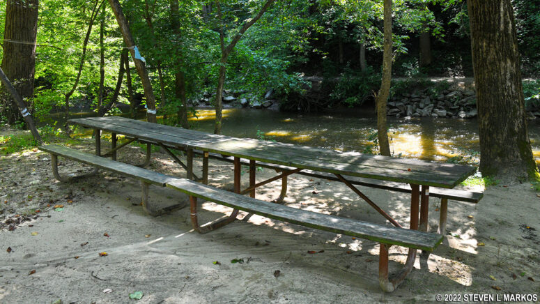 Picnic tables by Millers Cabin at Rock Creek Park's Picnic Area #6