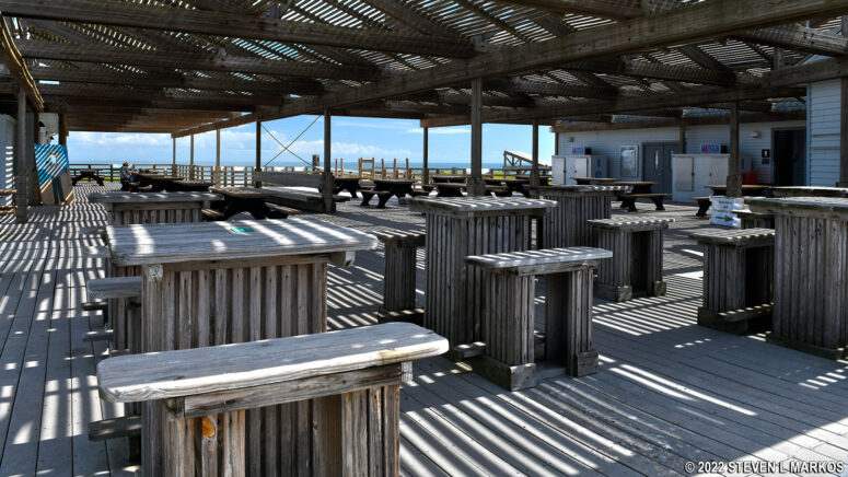 Bar tables and picnic tables at the Malaquite Visitor Center, Padre Island National Seashore