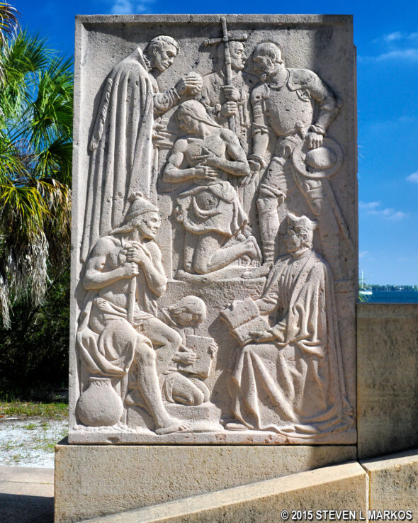 Relief sculpture on the rear panel of the Holy Eucharist Monument at Riverview Pointe Preserve in Bradenton, Florida