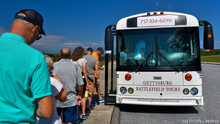 Visitors board the bus for a tour of Gettysburg National Military Park