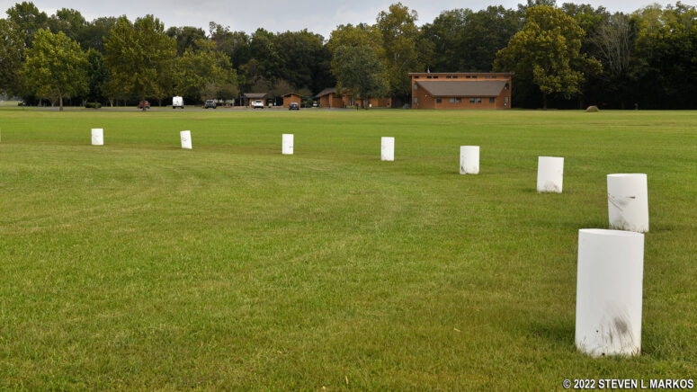PVC pipes mark the location of ancient post holes at Poverty Point National Monument