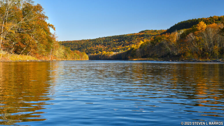 Calm section of the Delaware River downstream from the Roebling Aqueduct in Lackawaxen, Upper Delaware Scenic and Recreational River