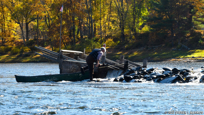 Man checking his eel trap on the Upper Delaware Scenic and Recreational River