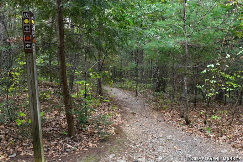 Yellow dots on sign posts mark the route of the Hackers Trail at Delaware Water Gap National Recreation Area