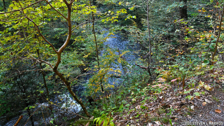 Lower Hornbecks Creek Trail in Delaware Water Gap National Recreation Area rises high above Hornbecks Creek
