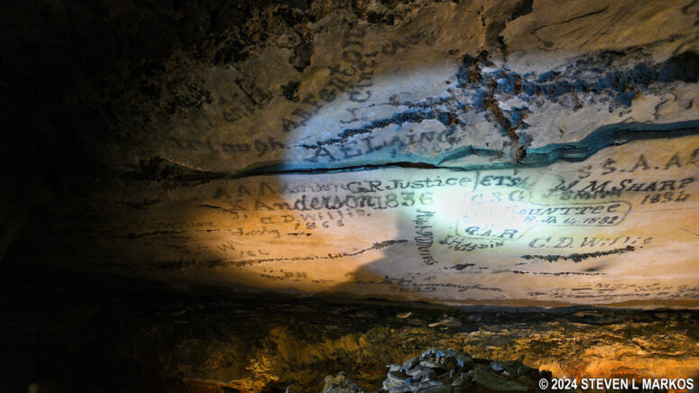 Graffiti-covered walls and ceiling of Gothic Avenue inside Mammoth Cave