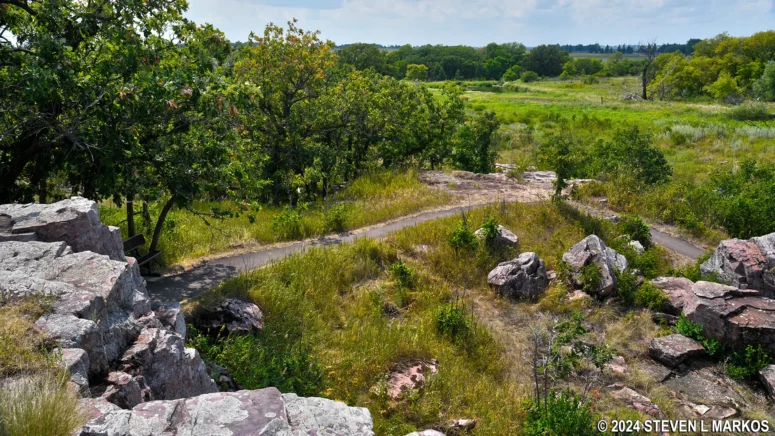 View of the Circle Trail from the top of the Sioux Quartzite Cliff at Pipestone National Monument