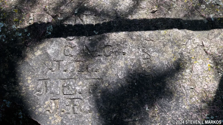 Text etched into the rock now known as the Nicollet Marker, Pipestone National Park