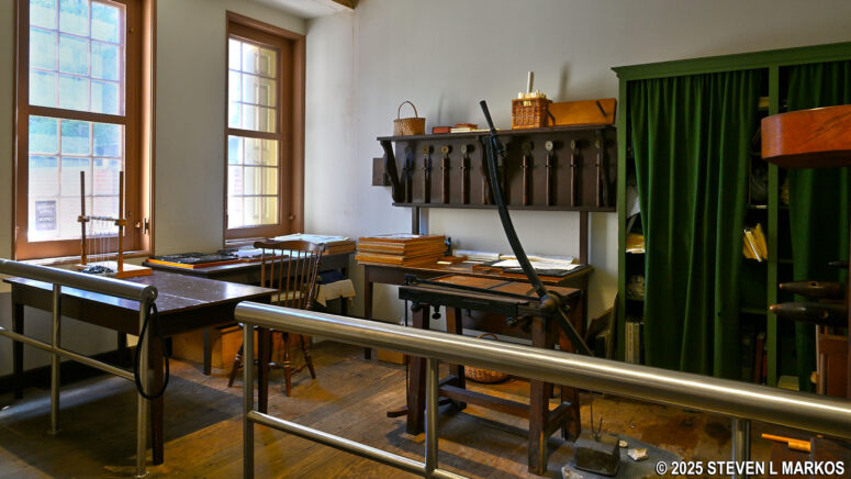 Book bindery equipment on display inside the Franklin Court Printing Office at Independence National Historical Park