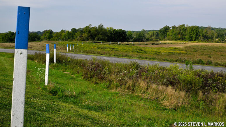 Blue-topped posts marked the location of American fortifications on the Saratoga battlefield, Saratoga National Historical Park