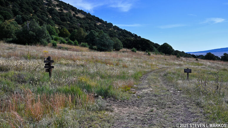 Lava Flow Trail splits from the gravel road near its halfway point, Capulin Volcano National Monument