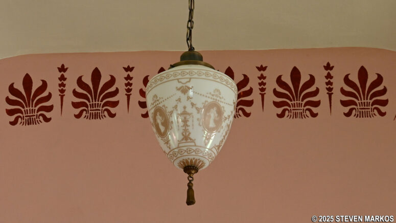 Original globes and restored Greco-styled stenciling inside Thompson Memorial A.M.E. Zion Church, Harriet Tubman National Historical Park