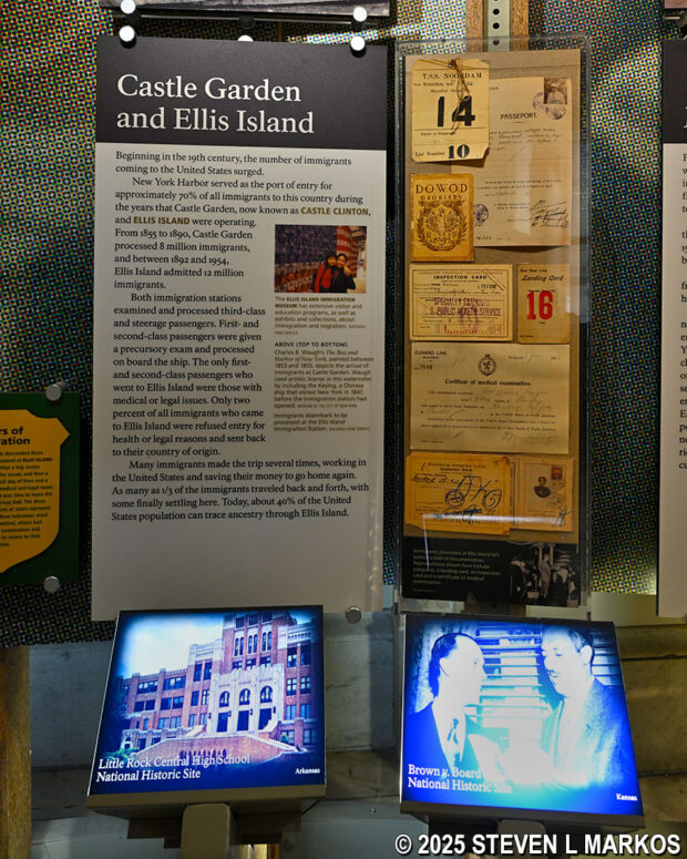 Passports and immigration documents from Ellis Island on display inside the Visitor Center at Federal Hall National Memorial
