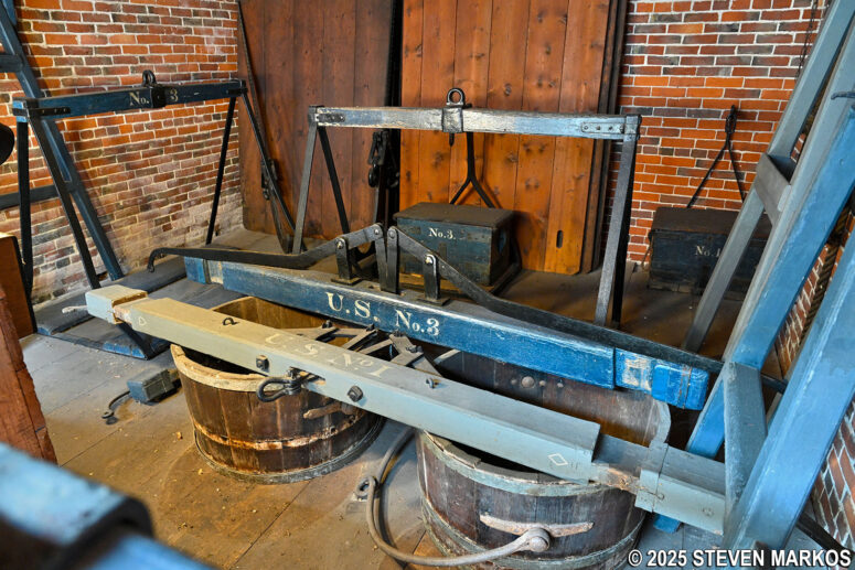 Collection of scales on display in the Scale House at Salem Maritime National Historical Park