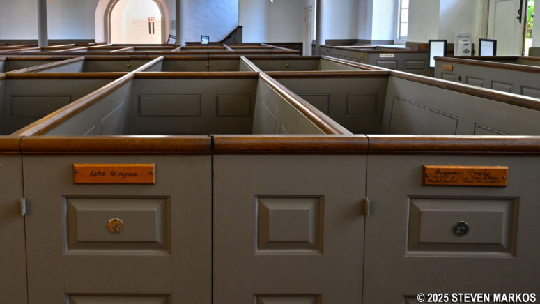 Plaques on the pews at Saint Paul's Church identify the families that owned them when the church first opened, Saint Paul's Church National Historic Site