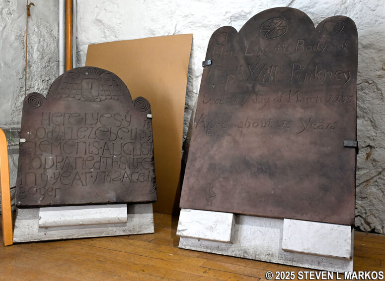 Old tombstones from the Saint Paul's Cemetery on display inside the Saint Paul's Church National Historic Site Visitor Center