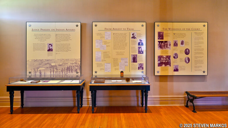 Display cases and information panels on Judge Parker's court process inside the Fort Smith National Historic Site Visitor Center