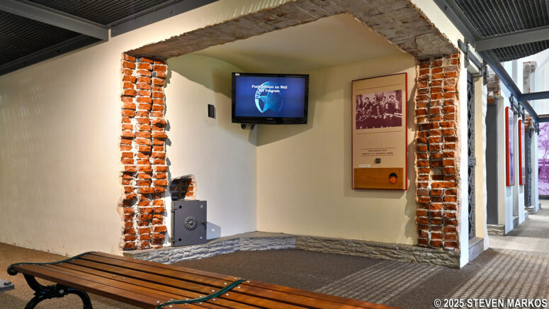 Exhibit with U.S. Marshals film inside the replica second jail at the Fort Smith National Historic Site Visitor Center