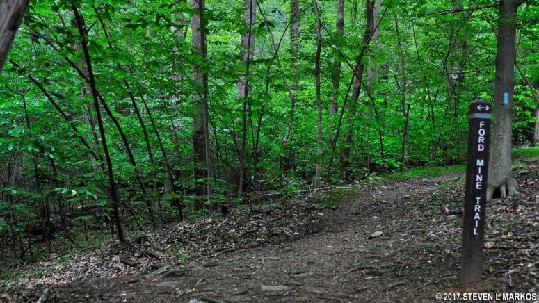 Start of the loop portion of the Ford Mine Trail in the Great Falls Tavern area of Chesapeake and Ohio Canal National Historical Park