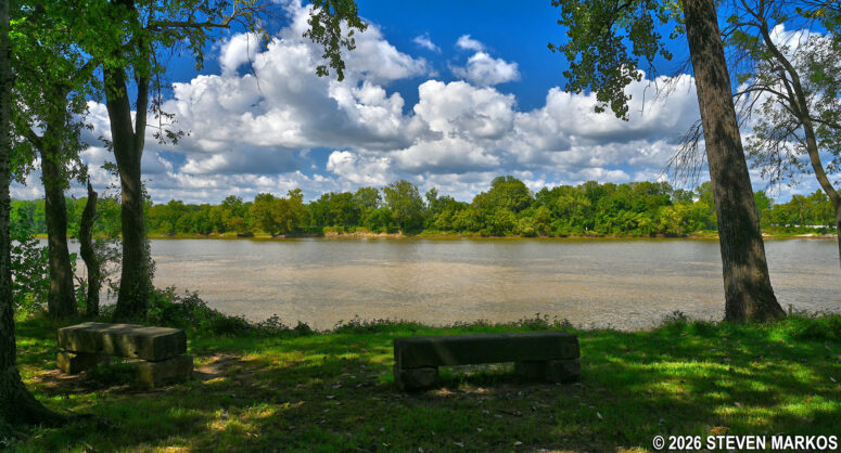 Stone benches along the riverbank on the River Loop Trail at Fort Smith National Historic Site