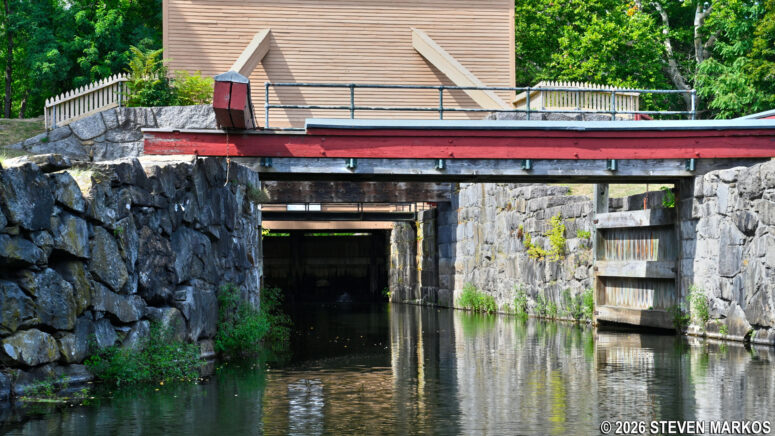 Tour boat enters the lift lock at the Guard Locks on the Pawtucket Canal in Lowell, Massachusetts